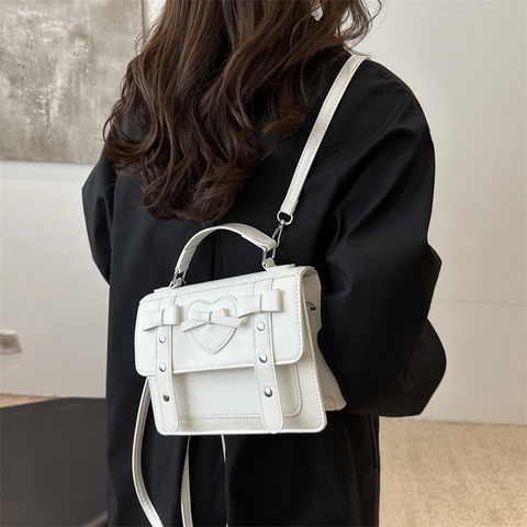 Vintage PU Leder Herz Schleife Rucksack Damen Preppy Style Umhängetasche Nieten College Schultasche