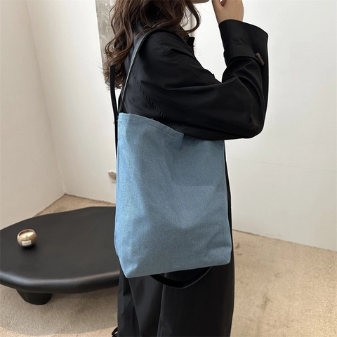 Minimalistische Denim Leinwand Eimer Schultertasche Für Damen Mode Schleife Große Kapazität Pendler Künstlerische Tote Tasche