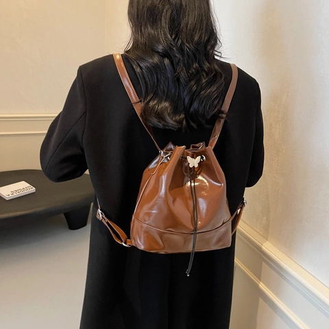 Women's PU Leather Bucket Backpack Urban Minimalist Fashion Large Capacity Drawstring Bag With Butterfly Buckle Daily Top