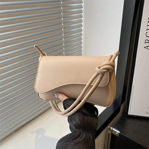 Women PU Leather Underarm Bag Minimalist Wave Flap Knotted Shoulder Strap Solid Color Commuting Baguette Shoulder Bag