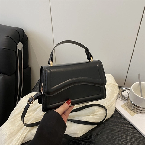 Bolso Bandolera de Cuero PU para Mujer Diseño Elegante de Nicho Color Sólido Minimalista Urbano Bolso de Mano Solapa Onda