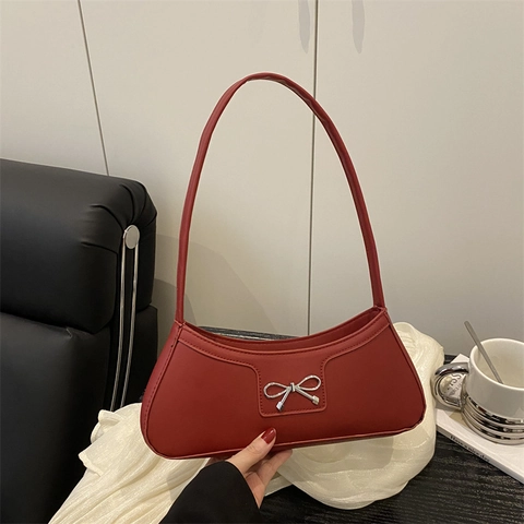 Fashion Bow Knot Underarm Bag 2025 New Korean Style PU Leather Solid Color Commuter Shoulder Baguette Hobo Bag For Women