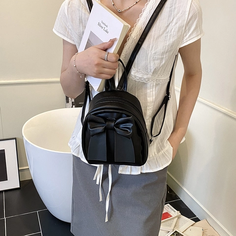 Mini Sac à Dos Coréen à Nœud Papillon pour Femme Cuir PU Durable Sac de Jour Mode Léger Sac de Voyage en Plein Air