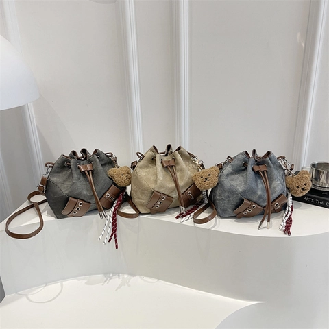 Sac Seau à Cordon en Toile et Cuir Synthétique Rétro pour Femmes Mode Oeillets Métalliques Sac Bandoulière Rue Décontracté Main