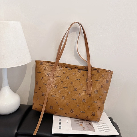 Damen Mode Vintage Bedruckte PU Leder Große Kapazität Tragetasche Casual Alltag Pendeln Schulter Handtasche Mit Monogramm Muster