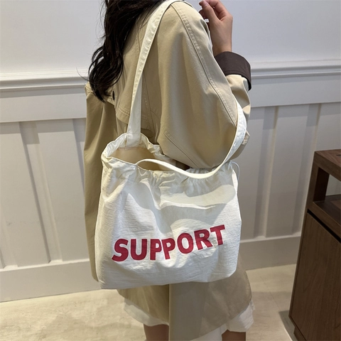 Große Kapazität Segeltuch Tragetasche Mit Support Buchstaben-Druck Kordelzug Schultertasche Casual Schule Shopping Handtasche Damen