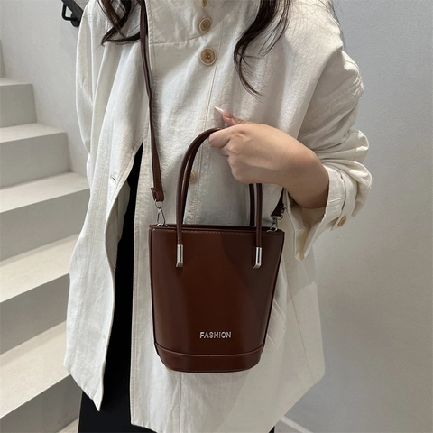 Bolso Cubo de Moda para Mujer Cuero PU Minimalista Color Sólido Estampado de Letras Bolso de Hombro Retro Moderno Diario