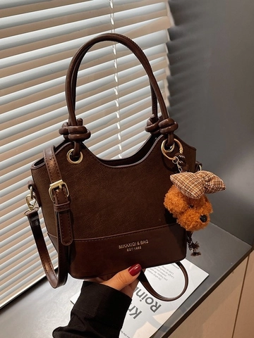 Borsa a Secchiello Vintage in Pelle PU da Donna Borsa a Tracolla alla Moda con Cuciture e Ciondolo a Orsetto Casual Versatile