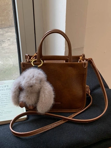 Damen Retro PU Eimer Tasche Minimalistische Strukturierte Handtasche Mit Plüsch Kaninchen Anhänger Umhängetasche Lässig Mode