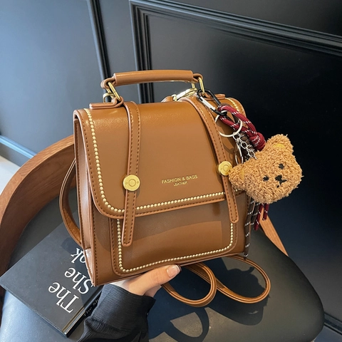 Vintage PU Leather Small Backpack For Women Rivet Stitching Commuter Shoulder Bag With Bear Pendant Korean Fashion Bag