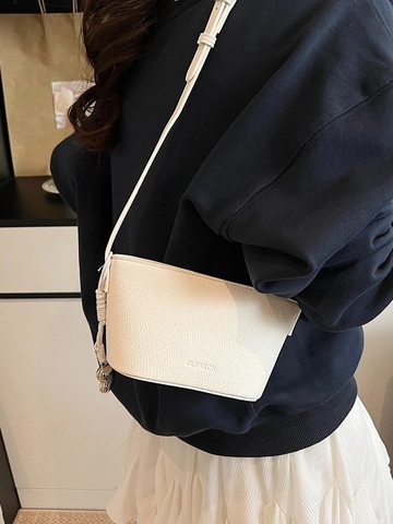 Women's Korean Minimalist PU Litchi Grain Bucket Bag Adjustable Strap Shoulder Crossbody Bag With Metallic Heart Pendant