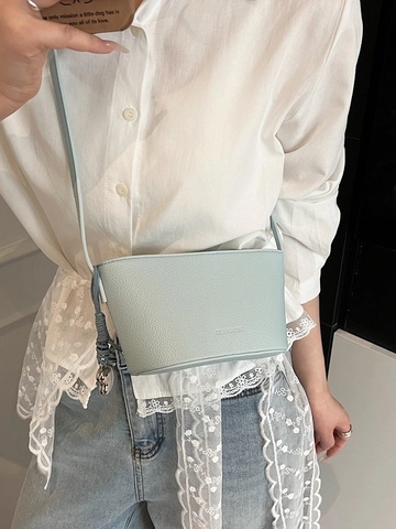 Women's Korean Minimalist PU Litchi Grain Bucket Bag Adjustable Strap Shoulder Crossbody Bag With Metallic Heart Pendant