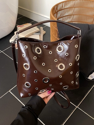 Borsa a Secchiello Vintage in Pelle PU Lucida da Donna Elegante con Occhielli in Metallo Traforata a Tracolla Per Street Trend