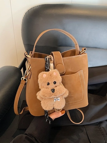 Vintage PU Leather Bucket Bag For Women Featuring Contrast Stitching And Plush Pendant Retro Commuting Shoulder Crossbody Bag