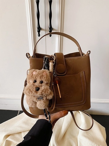 Vintage PU Leather Bucket Bag For Women Featuring Contrast Stitching And Plush Pendant Retro Commuting Shoulder Crossbody Bag