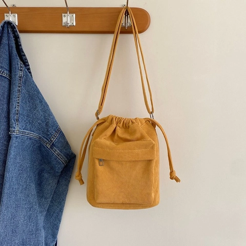 Vintage Corduroy Drawstring Bucket Bag For Women Minimalist Canvas Shoulder Bag Small Casual Crossbody Bag With Front Pocket
