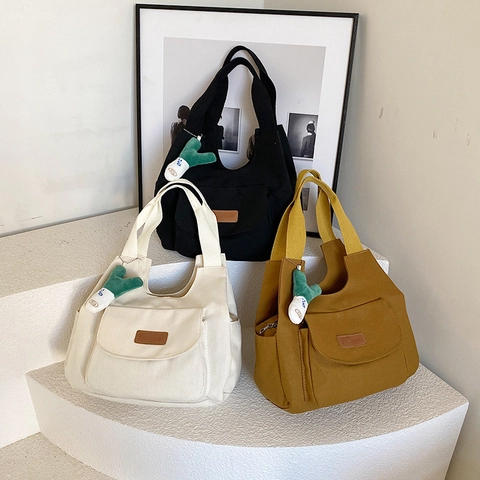 Women Casual Canvas Tote Bag With Plush Scallion Pendant Large Capacity Shoulder Bag Solid Color Japanese Style Handbag