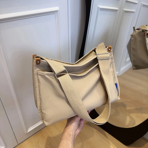 Nylon Messenger Crossbody Bag Large Capacity Multi Compartment Adjustable Wide Strap For School Travel Minimalist Bag
