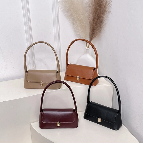 Bolso de Axila de Cuero PU Minimalista Urbano Vintage para Mujer Elegante Bolso de Hombro Baguette de Color Sólido Con Cierre de Metal