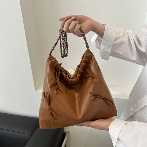 Damen PU Leder Schleife Kordelzug Eimertasche Metallkette Umhängetasche Kleine Frische Süße Handtasche Tragetasche