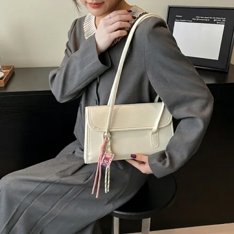 Women PU Leather Shoulder Bag Solid Color Simple Underarm Bag Retro Tote Bag With Pendant Versatile Fashion Baguette Bag