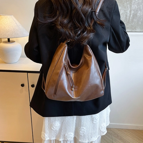 Damen Große Kapazität Vintage PU Leder Tragetasche Mode Pendeln Schulter Umhängetasche Retro Mehrzweck Rucksack Quaste