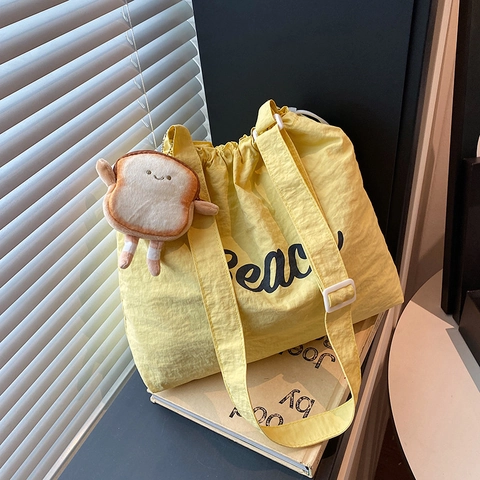 Large Capacity Beach Letter Printed Tote Bag Drawstring Washed Cloth Shoulder Bag with Cute Toast Pendant for Women School Travel