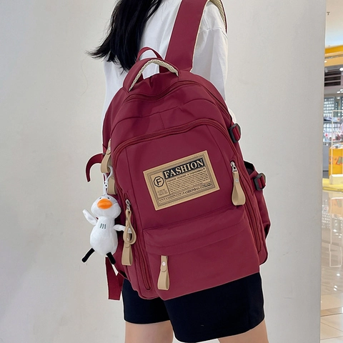 Mochila de Tela Oxford de Gran Capacidad para Mujeres Hombres Casual Color Sólido Mochila Escolar con Colgante de Pato Mochila de Moda Diaria