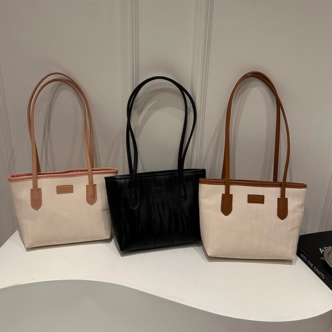 Minimalistische Tragetasche aus PU-Leder mit Wellenstruktur Große Kapazität Pendler-Schultertasche für Damen Lässige Alltagshandtasche