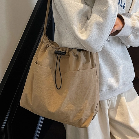 Large Capacity Canvas Drawstring Bucket Bag For Women Japanese Casual Crossbody Shoulder Bag Urban Minimalist Commuter Tote Bag