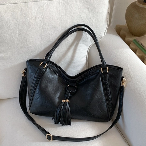 Damen Retro PU Leder Große Kapazität Tragetasche Western Stil Quaste Dekoration Schultertasche Gewebte Nähte Reise Handtasche