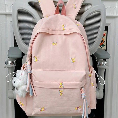 Zaino Carino Con Ricamo a Fiocco Per Ragazze Studenti Nylon Grande Capacità Zaino Da Viaggio Versatile Con Ciondolo In Peluche