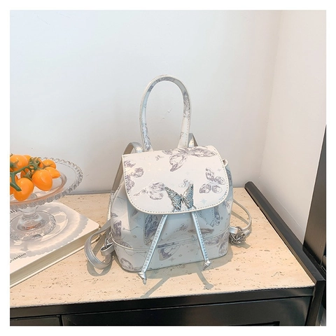 Mini Sac à Dos Imprimé Papillon pour Femme Sac à Épaule en Cuir PU à la Mode avec Boucle en Métal Cordon de Serrage Fermeture à Rabat Style Doux Y2K Quotidien