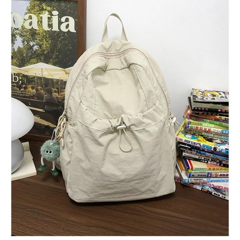 Mochila de Nailon Minimalista para Mujer Mochila Escolar Casual de Color Sólido a la Moda con Bolsillo de Cordón Bolso de Hombro Ligero