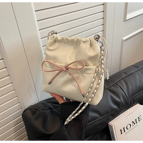 Women PU Leather Bow Bucket Bag Shiny Metallic Drawstring Shoulder Bag With Chain Strap Versatile Casual Crossbody Handbag For Fashionable Ladies