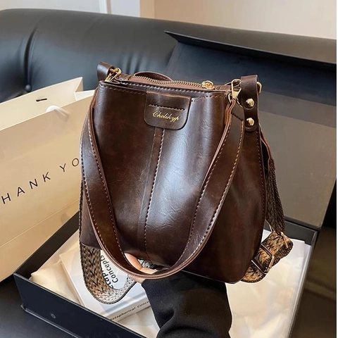 Retro PU Leder Eimertasche Damen Große Kapazität Umhängetasche Ethnisch Geometrischer Gewebter Gurt Vintage Schultertasche