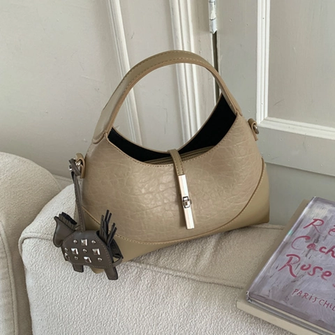 Women's Niche Design PU Leather Hobo Crossbody Bag Half Moon Shoulder Bag With Metal Piston Buckle And Horse Charm Handbag