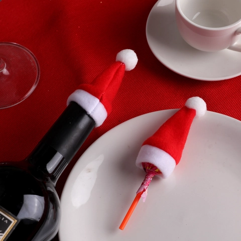 Mini Bonnet de Père Noël Porte-couverts Décoration de Noël en Tissu Brossé pour Vaisselle Bouteilles Bonbons Maison Fête