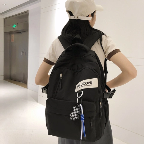 Poluconi Minimalistischer Casual Rucksack Für Damen Und Herren Große Kapazität College Student Schultasche Nylon Tasche Mit Bär Anhänger