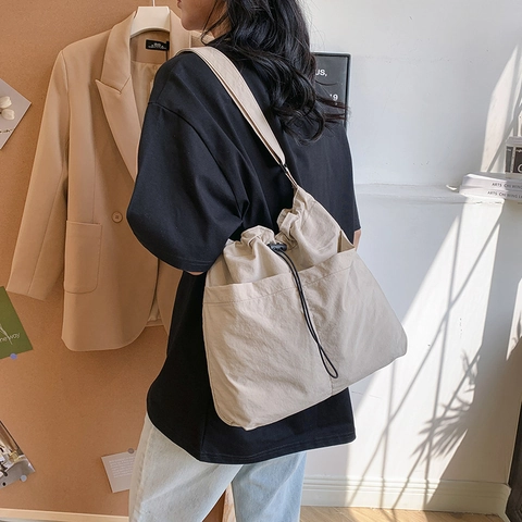 Women Large Capacity Canvas Drawstring Bucket Bag Street Casual Shoulder Crossbody Bag With Adjustable Strap Commuter Handbag