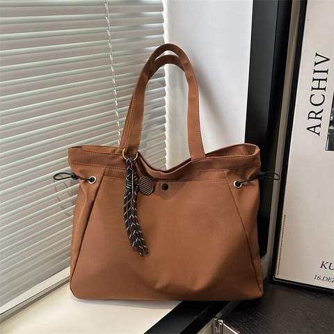 Women Large Capacity Nylon Tote Bag Urban Minimalist Drawstring Shoulder Bag Durable Commuting Travel Handbag With Charm