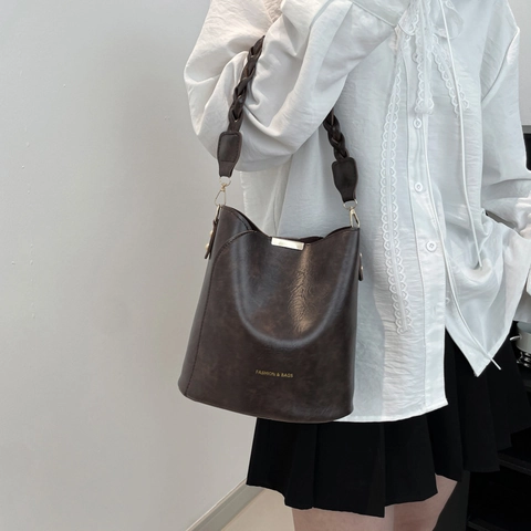 Vintage PU Leather Bucket Bag For Women Retro Woven Handle Shoulder Bag With Plush Rabbit Pendant Versatile Crossbody Bag