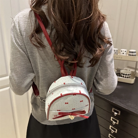 Sac à Dos Mode Femme Doux Imprimé Nœuds Et Pois Style Preppy Cuir Synthétique Mini Sac de Jour Avec Pendentif Cœur Sac d'École