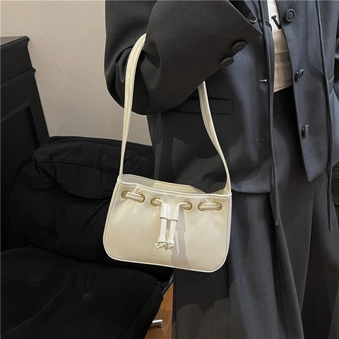 Chic Women PU Leather Underarm Bag Vintage Drawstring Shoulder Bag With Metal Eyelets Solid Color Small Tote Bag For Commuting Party