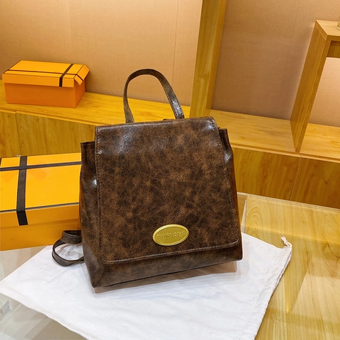 Damen Vintage Minimalistisch PU Leder Rucksack Mode Klappe Pendler Schultertasche Mit Metalldekoration Für Den Täglichen Gebrauch