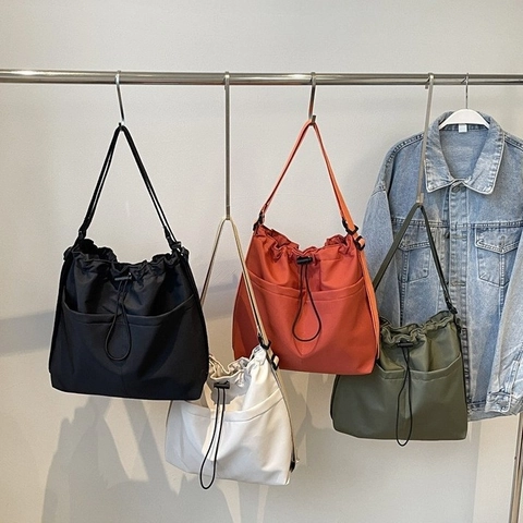 Women Large Capacity Canvas Bucket Bag Streetwear Drawstring Shoulder Crossbody Bag Casual Daily Travel Tote With Pockets