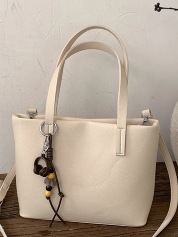 Minimalist PU Leather Bucket Bag For Women Large Capacity Retro Solid Color Shoulder Bag With Headphone Charm Korean Style Crossbody Bag