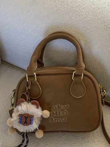 Retro PU Leather Bowling Bag For Women Fashion Embossed Letter Shoulder Crossbody Bag Minimalist Niche Design Handbag With Plush Pendant