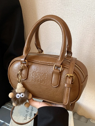 Bolso de Mano Boston de Cuero PU para Mujer Bolso Bandoulière Retro Color Sólido Con Lindo Colgante de Monstruo Correa Ajustable Bolso de Hombro