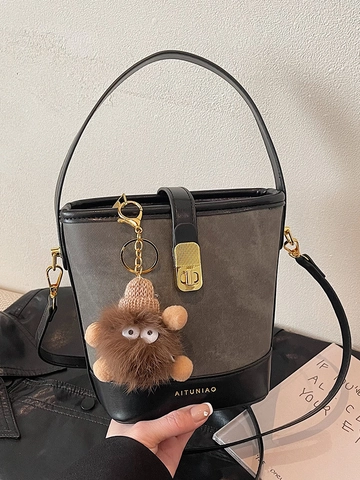 Women's PU Leather Color-Blocked Bucket Bag With Gold Lock And Furry Monster Charm Stylish Urban Crossbody Shoulder Bag